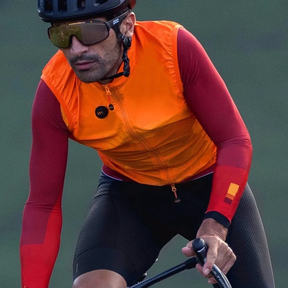 

Orange Autumn Top Quality PRO Team Lightweight Windproof Cycling Gilet Men Or Women Cycling Windbreak Vest Mtb Wind Vest