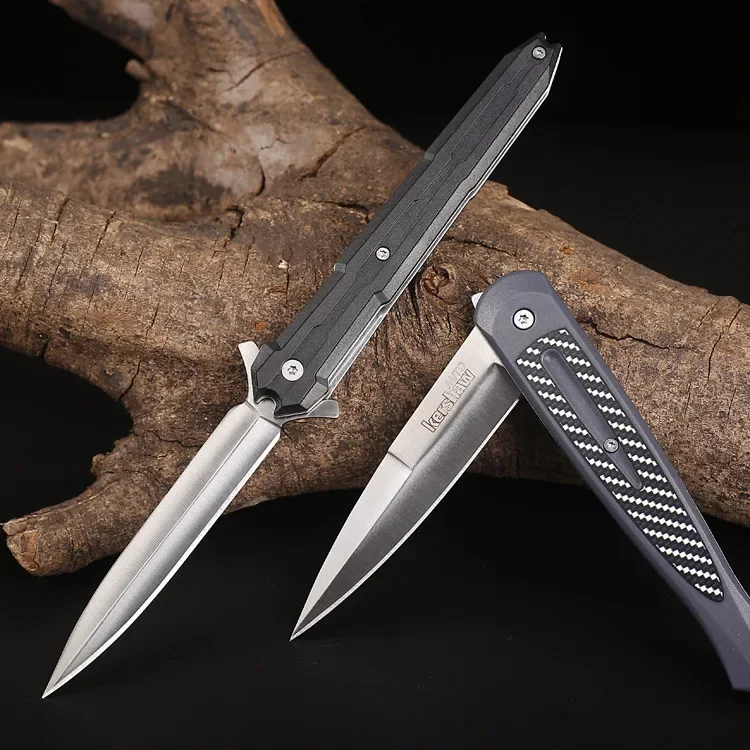 

Folding knife with plastic handle and clip