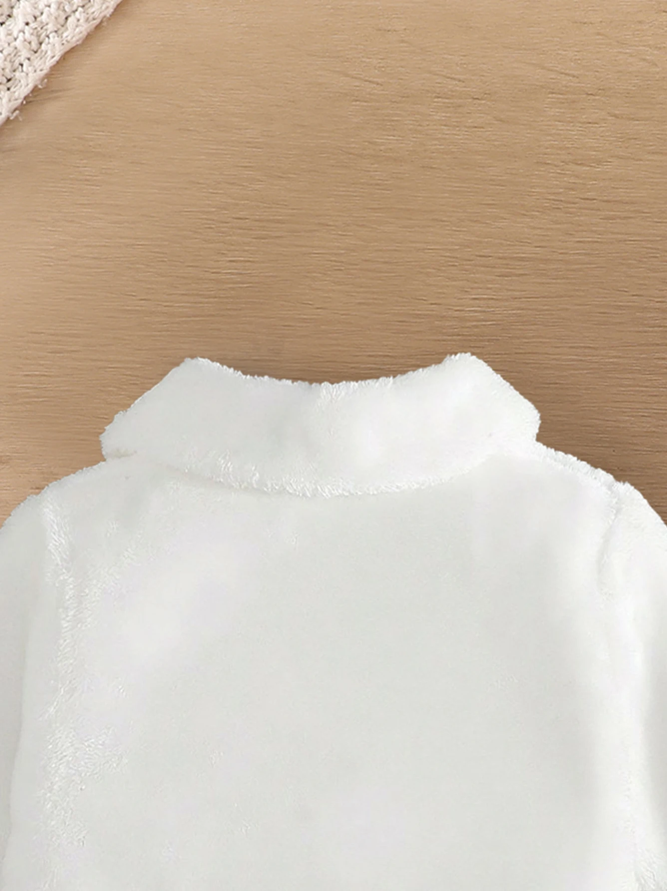 Close-up of collar and stitching