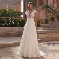 2025 A-Line Lace Wedding Dress Brides Boho Women Cap Sleeve V-Neck Open Back Luxury Lace Elegant Bridal Gown Customized 1