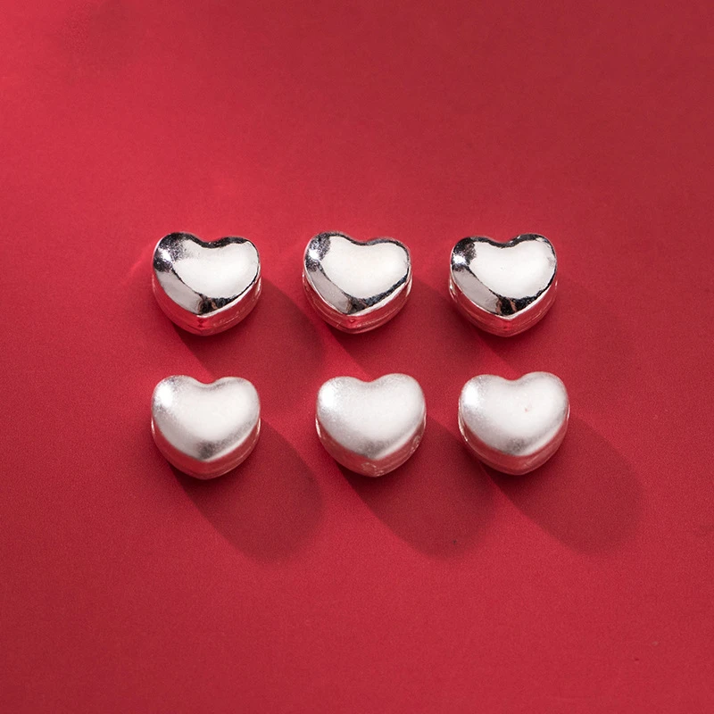 

Бусины-шармы из серебра 100% пробы с отверстиями