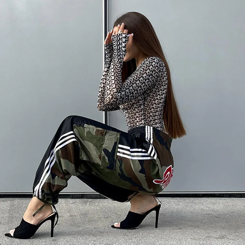 New Sexy Long Sleeved Tight Fitting Interior with Trendy Letter Printed Mesh See Through Jumpsuit for Women