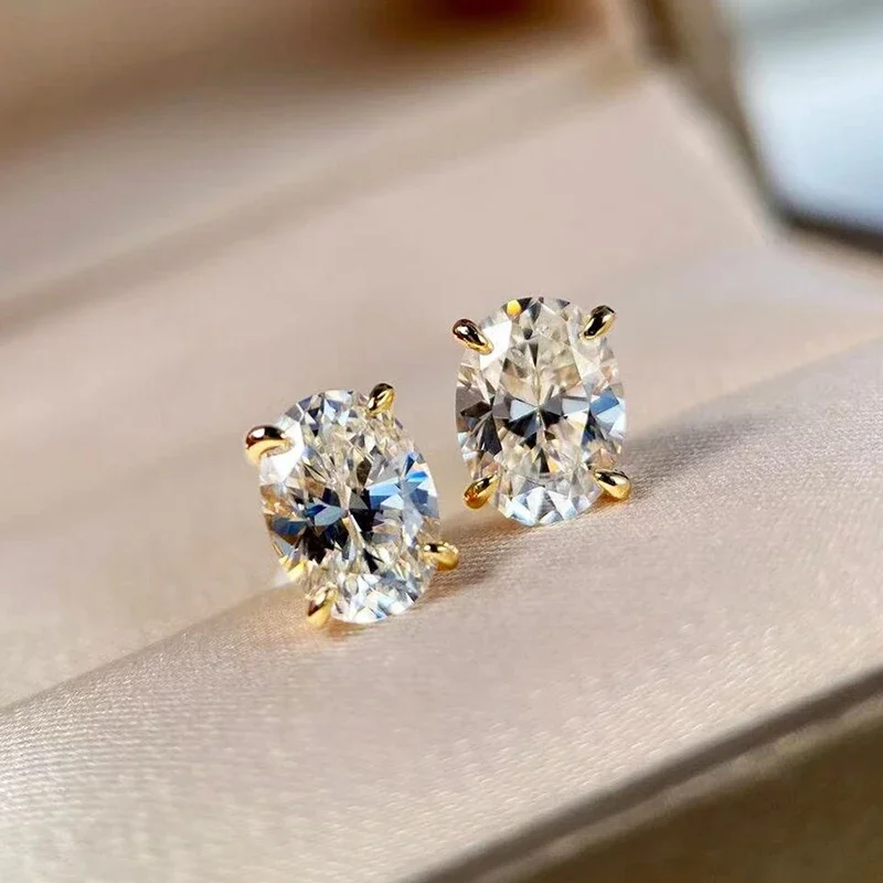 Huitan Vielseitige Damen-Ohrstecker mit funkelndem ovalem Zirkonia für Hochzeits- und Party-Accessoires, modischer goldfarbener Alltagsschmuck – Detail 1