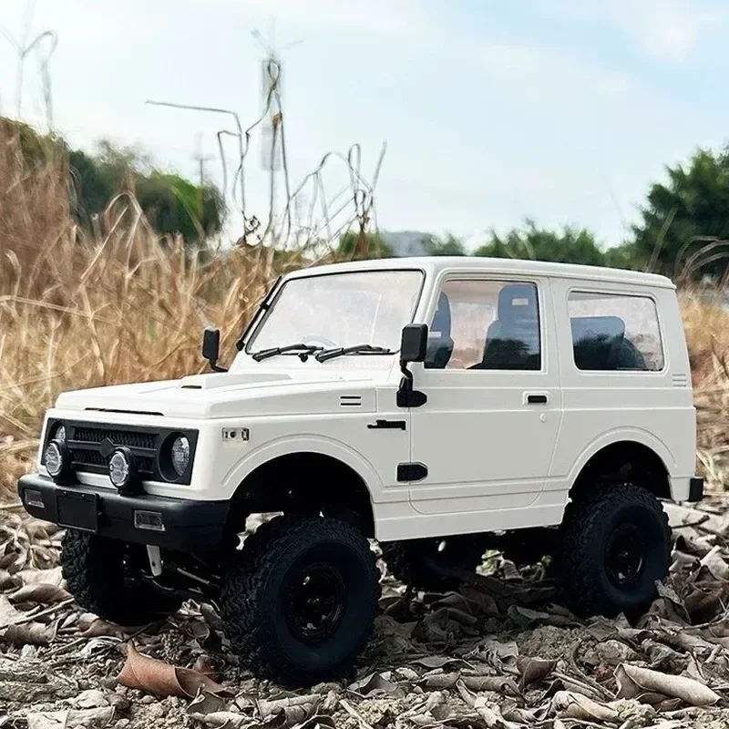 

KYU 1/10 WPL C74 2.4G Full-Scale Jimny Warrior JA11 4WD Climbing Track Remote Control Car Model Children's remote control toy