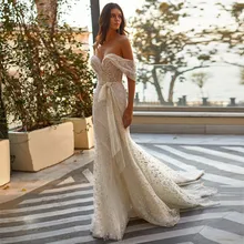 

RANMO Sparkly Off The Shoulder Beach Wedding Gown Trumpet Court Train Sash Chic Bride Dress Pleat Zipper Up Modern Wedding Dress