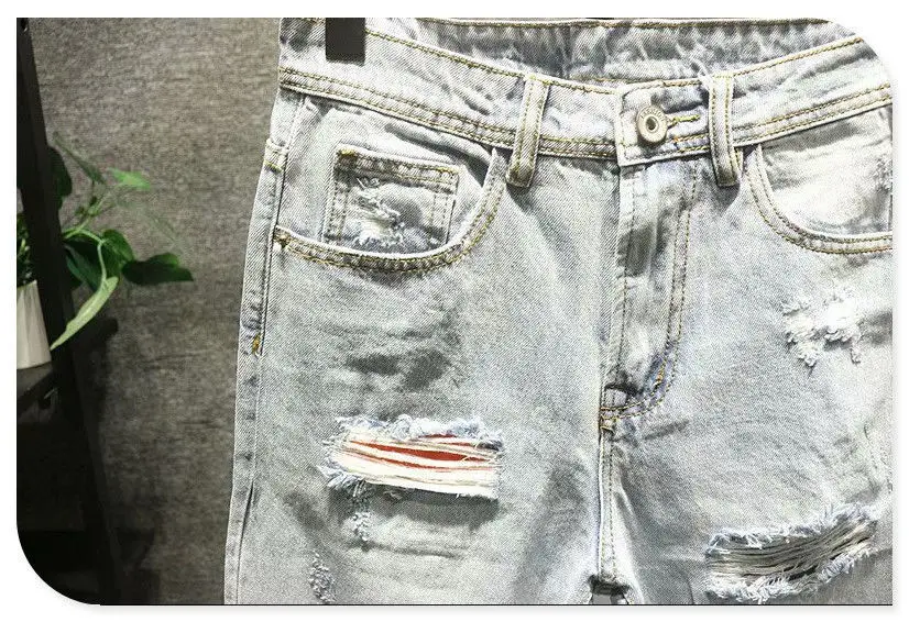 Jeans strappati per uomo 2022 Abiti vintage Foro patch Pantaloni