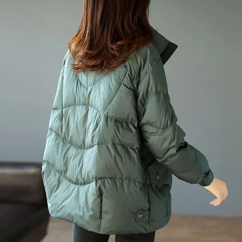 Рисунок 3 - Женская свободная куртка с воротником-стойкой