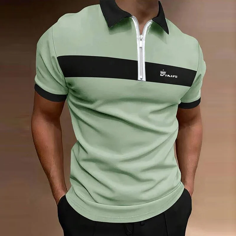 Man wearing a slim-fit short sleeve zipper polo shirt with color-block design, standing confidently in bright summer light green