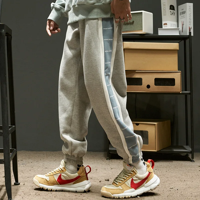 

Свободные мужские шаровары в стиле пэчворк, мужские осенние новые модные повседневные брюки, Мужская черная уличная одежда, мужские спортивные брюки, аналогично