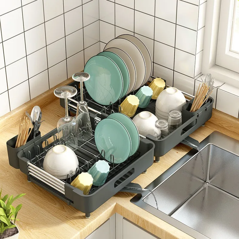 https://ae01.alicdn.com/kf/Sf0123269e6d24389970498d337e2084cS/Dish-Drying-Rack-Drainer-Cleaning-Brush-Holder-Expandable-Plates-Rust-Resistant-Dish-Racks-Kitchen-Organizer-Countertop.jpg