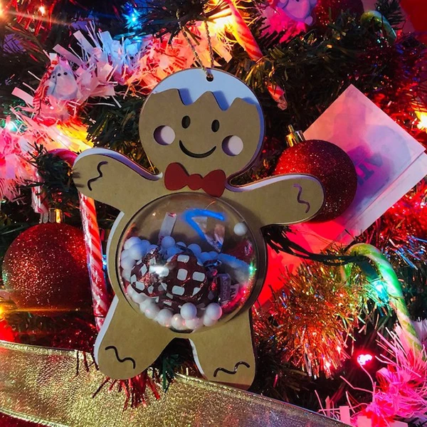 A detailed metal gingerbread cutting die designed for Christmas tree ornaments, candy holders, and festive scrapbook or craft decorations. 05