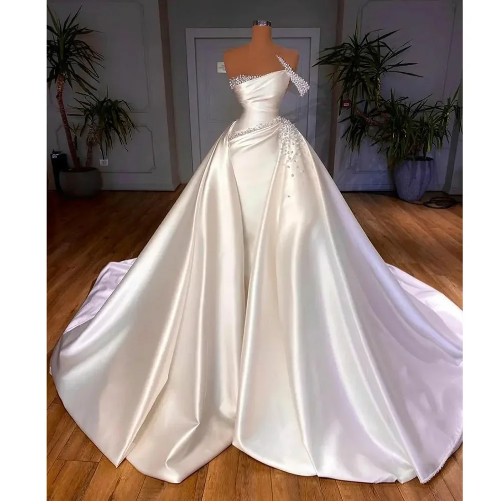 

Luxury Pearls Bride Dress 2024 Elegant Sleeveless Beading Mermaid Gowns with Detachable Tail Fashion Court Train Wedding Dress