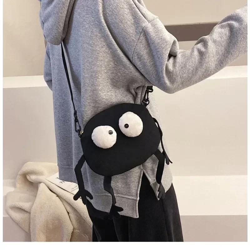 حقيبة كتف مبتكرة ومتعددة الاستخدامات، حقيبة ساعي صغيرة من القماش على شكل قماش حجري أسود للفتيات، حقيبة صغيرة قبيحة لطيفة ومضحكة