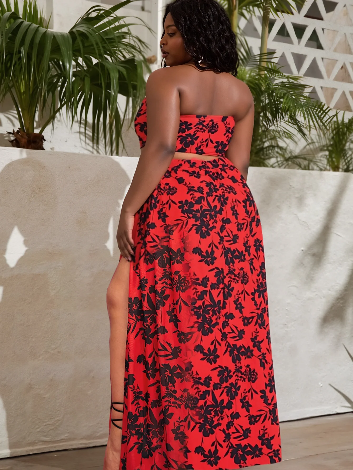 Beach cover up detail with sheer fabric, side slit effect, and flowing movement