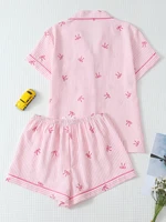 Ensemble pyjama deux pièces confortable à rayures et motifs de cœurs, haut à col boutonné à manches courtes avec poches et short à nœud, ensemble de vêtements de détente pour femme printemps/été, adapté à un usage domestique 2