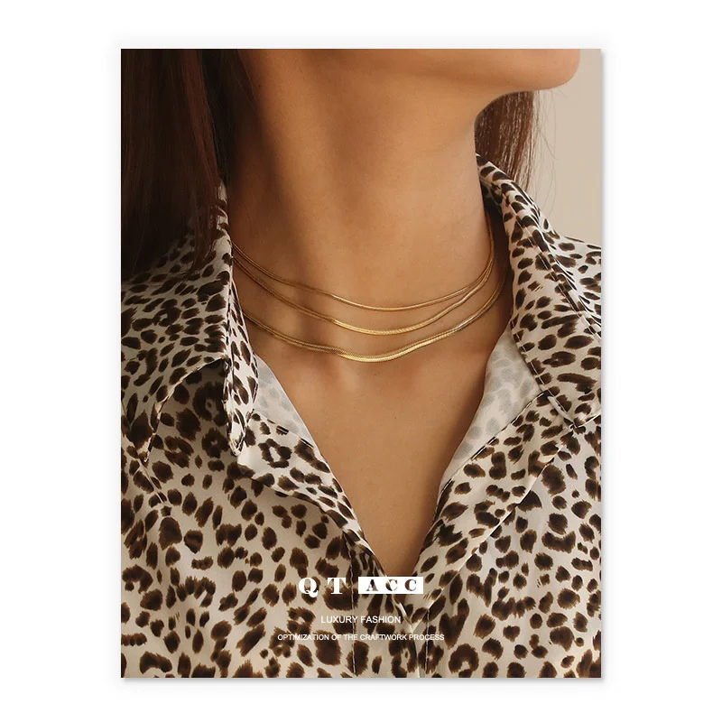 

High color retention titanium steel electroplated with genuine gold, fashionable and simple flat chain, stacked snake bone chain