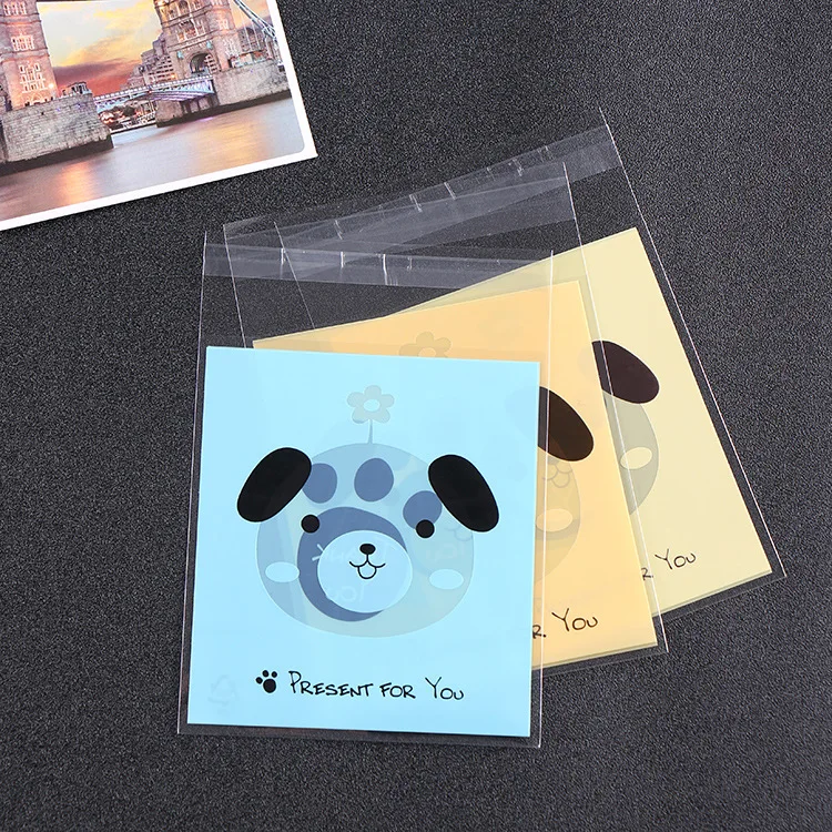 

Bear footprint self-sealing bag cookie opp printed self-adhesive sealed food packaging 10*10+3