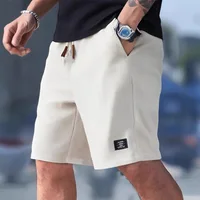 Shorts de sport décontractés pour hommes, à carreaux, amples, longueur genou, style américain, mode sportive urbaine 1