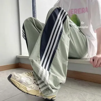 Pantaloni casual a gamba dritta da uomo ad asciugatura rapida Estate stile sottile a tre strisce Blocco colore Vestibilità ampia Stile americano Sport Paratr 1