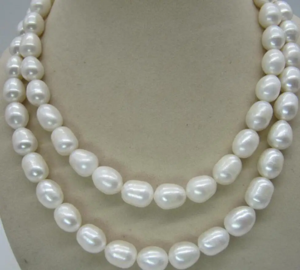 

Natural 32 inch 9-10mm South Sea White Pearl Necklace 14k yellow gold clasp