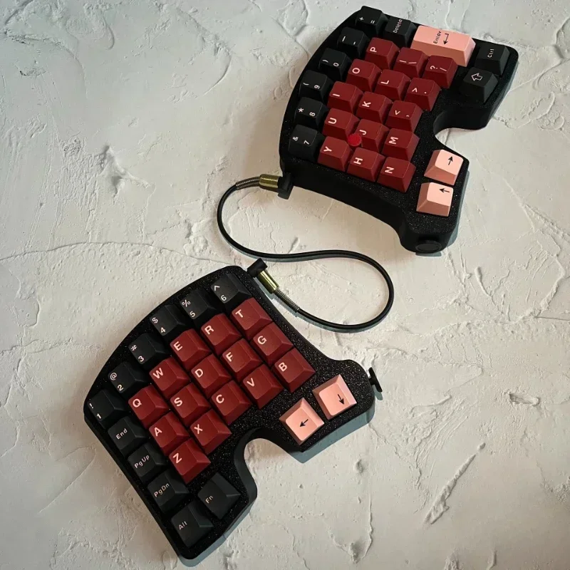 人間工学に基づいたメカニカルキーボードキット、小さな赤い点