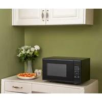 0.9 cubic foot matte black microwave oven with 6 quick setting menu options, easy to read LED display, and child safety lock 2