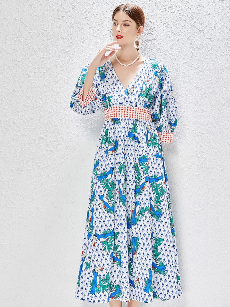 

Summer new women's wear European and American vintage V-neck, seven-point sleeve, Bohemian travel beach style loose long dress