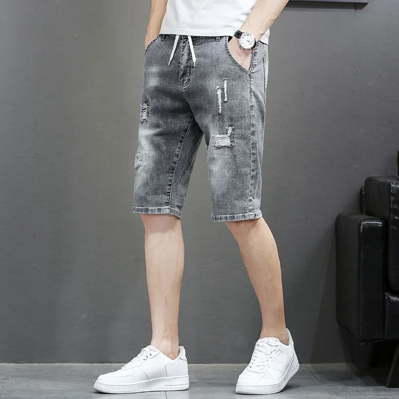 thumbnail image 1 of Pantalones cortos de mezclilla para hombre, elásticos, con cordón, rotos y bolsillos, pantalones vaqueros cortos para hombre, tendencia original de lujo 2024, ropa de calle grosera, emo, 1 of 5