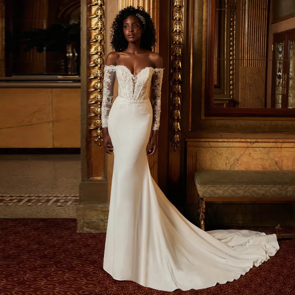 Africa Wedding Dress Long Sleeves Deep V Neck Lace Applique Backless Zipper Buttons Jersey Mermaid Bridal Gown