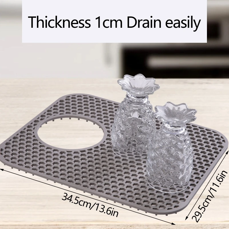 https://ae01.alicdn.com/kf/Sf0e75da3d0f44fde8c0283193c20b9d6E/Silicone-Kitchen-Sink-Protector-Mat-Folding-Heat-Resistant-Drain-Pad-Sink-Divider-Mat-Quick-Draining-Dish.jpg