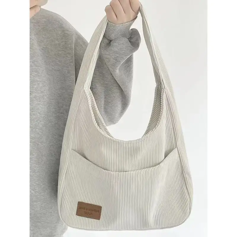 

Large capacity corduroy bag female han edition joker single shoulder bag 2023 new tide of fashion students tote bags