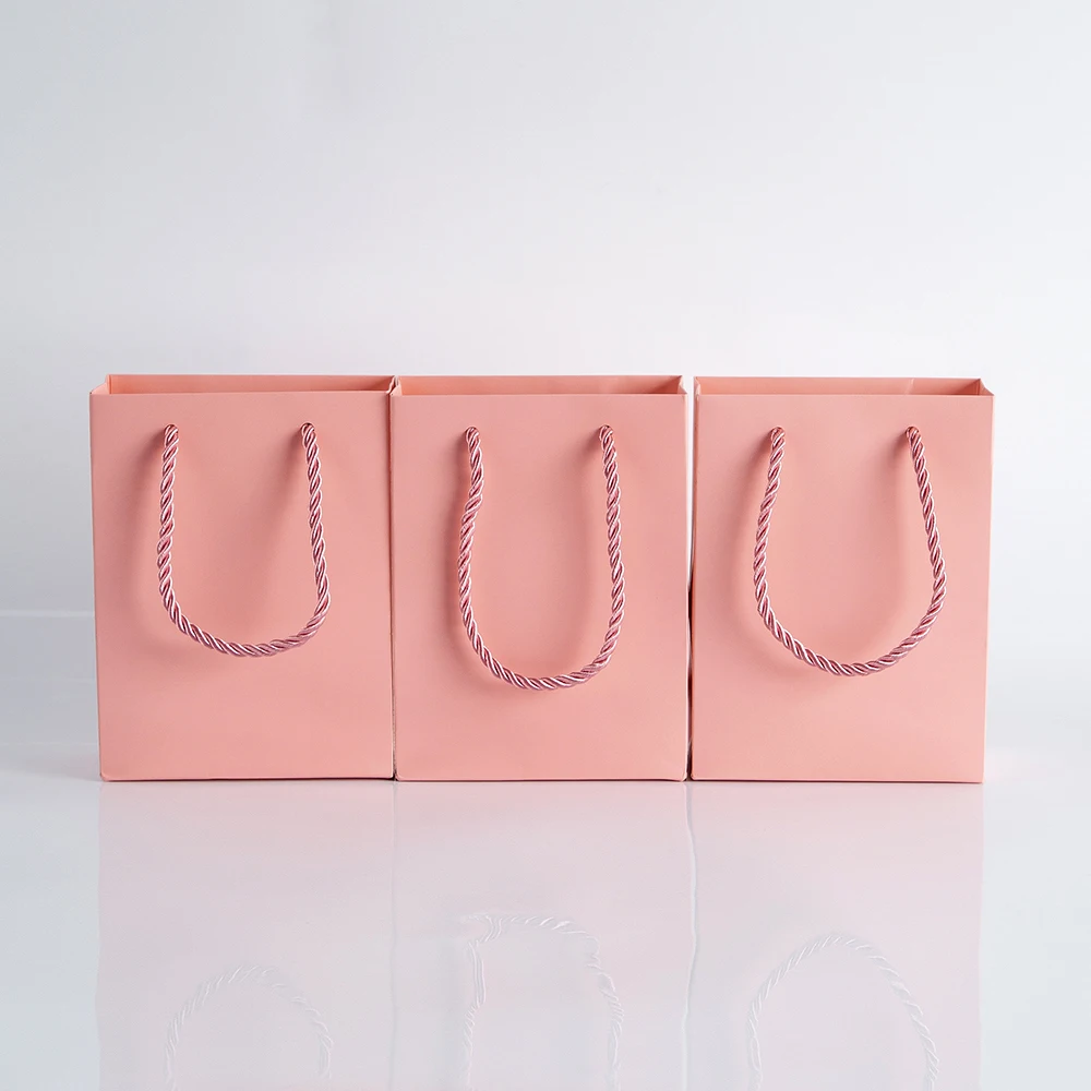 2450100pcsMiniSmallKraftPaperBagwithHandlesFestivalGiftBag