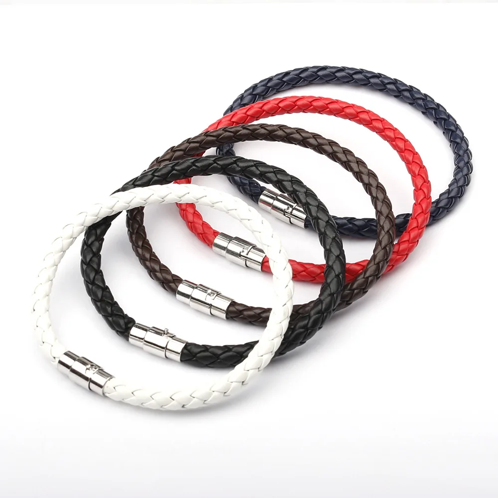 Set of braided leather bracelets in black, red, and white with metal clasps on a white background