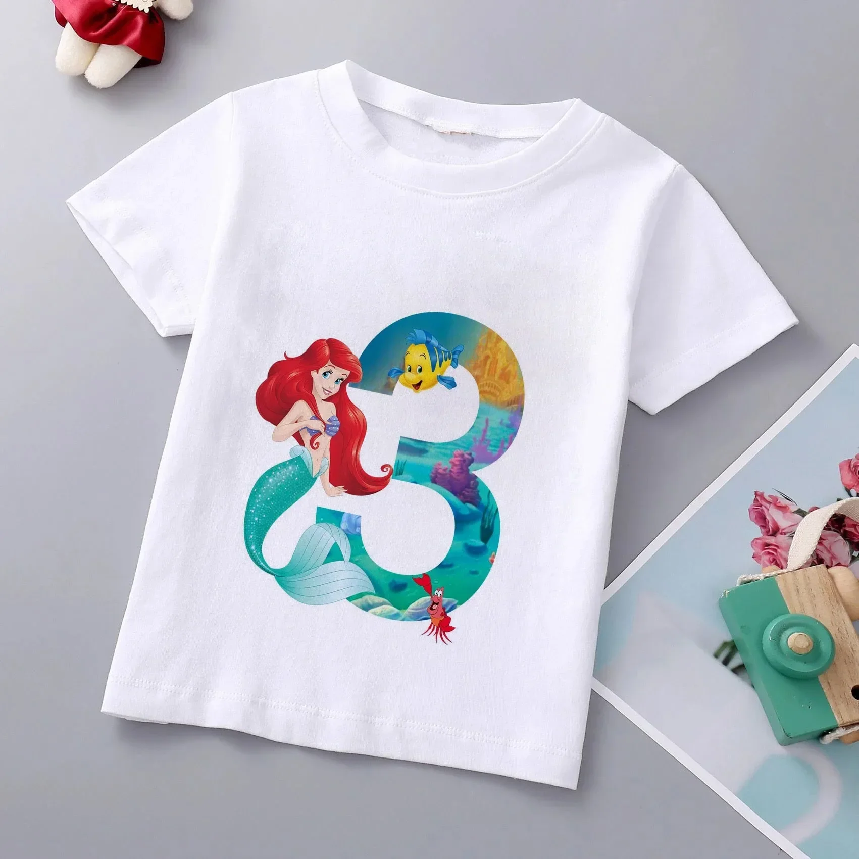 thumbnail image 1 of Camiseta de algodón con estampado de princesa sirena para niñas de la marca Disney, ropa de princesa Ariel, top de dibujos animados para niños de 1 a 9 años, regalo de cumpleaños para niños, 1 of 5