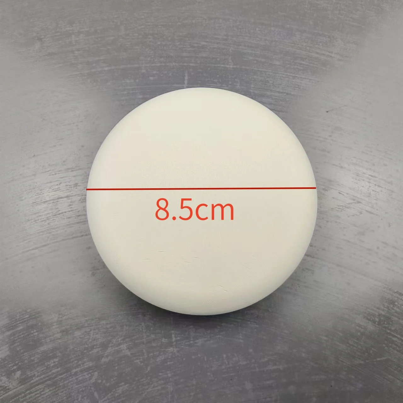 Painted white stone, apple stone, children's handmade drawing, hand drawn circular stone