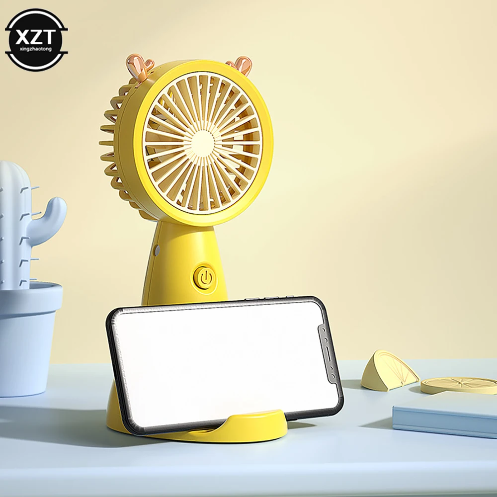 

USB Mini Handheld Desktop Portable Rechargeable Electric Fan with Base Mobile Phone Bracket for Travel Outdoor