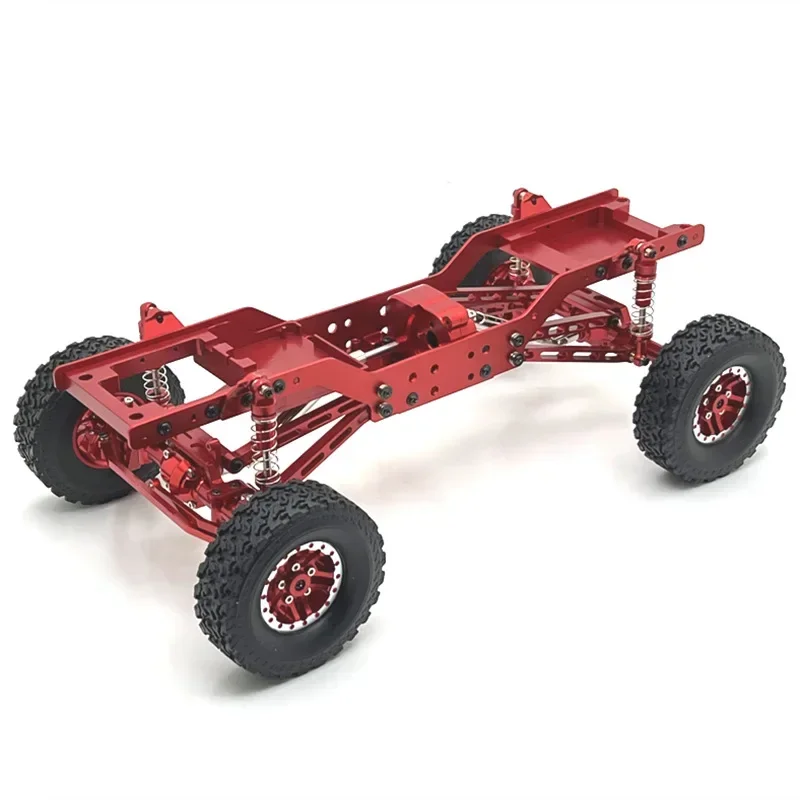 Crawler Buggy RC 4WD Tout Terrain - MN168-R Vert sur un rocher, prêt pour l'aventure