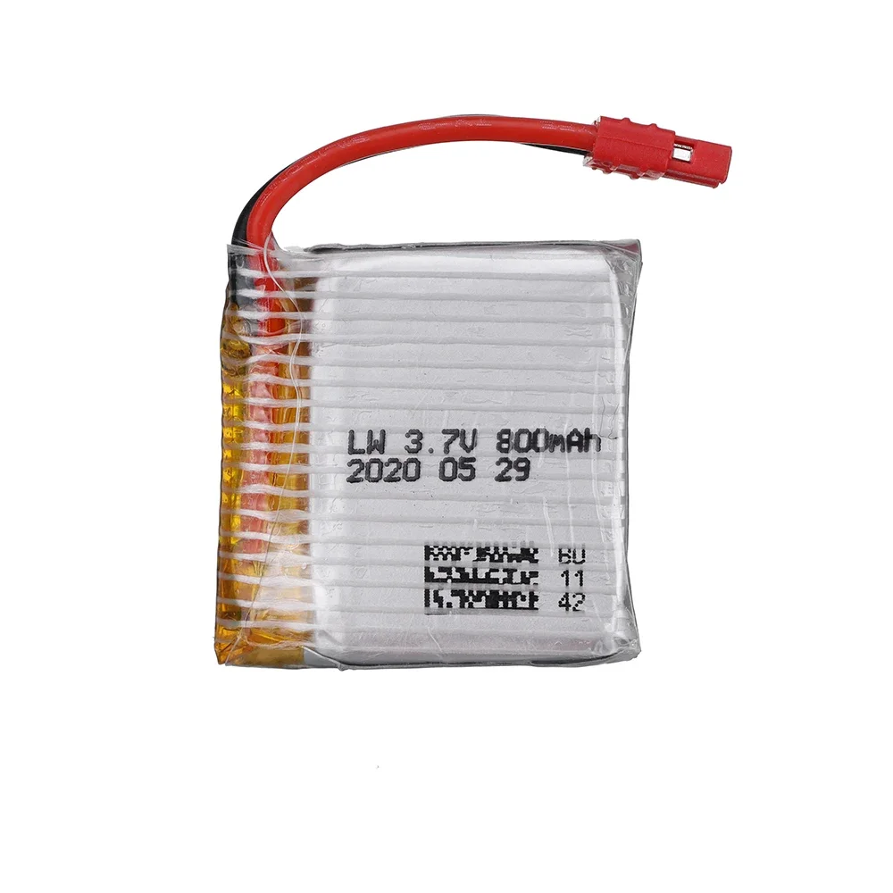 Deux batteries Lipo 3.7V pour drone SYMA X21, côte à côte avec connecteurs visibles.