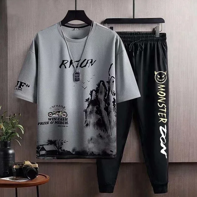 Conjuntos de pantalones de corte regular de primera calidad Pantalones deportivos Ropa para hombre Trajes deportivos con alfabeto Chándal gris Camiseta gráfica Sudadera para hombre Elegante