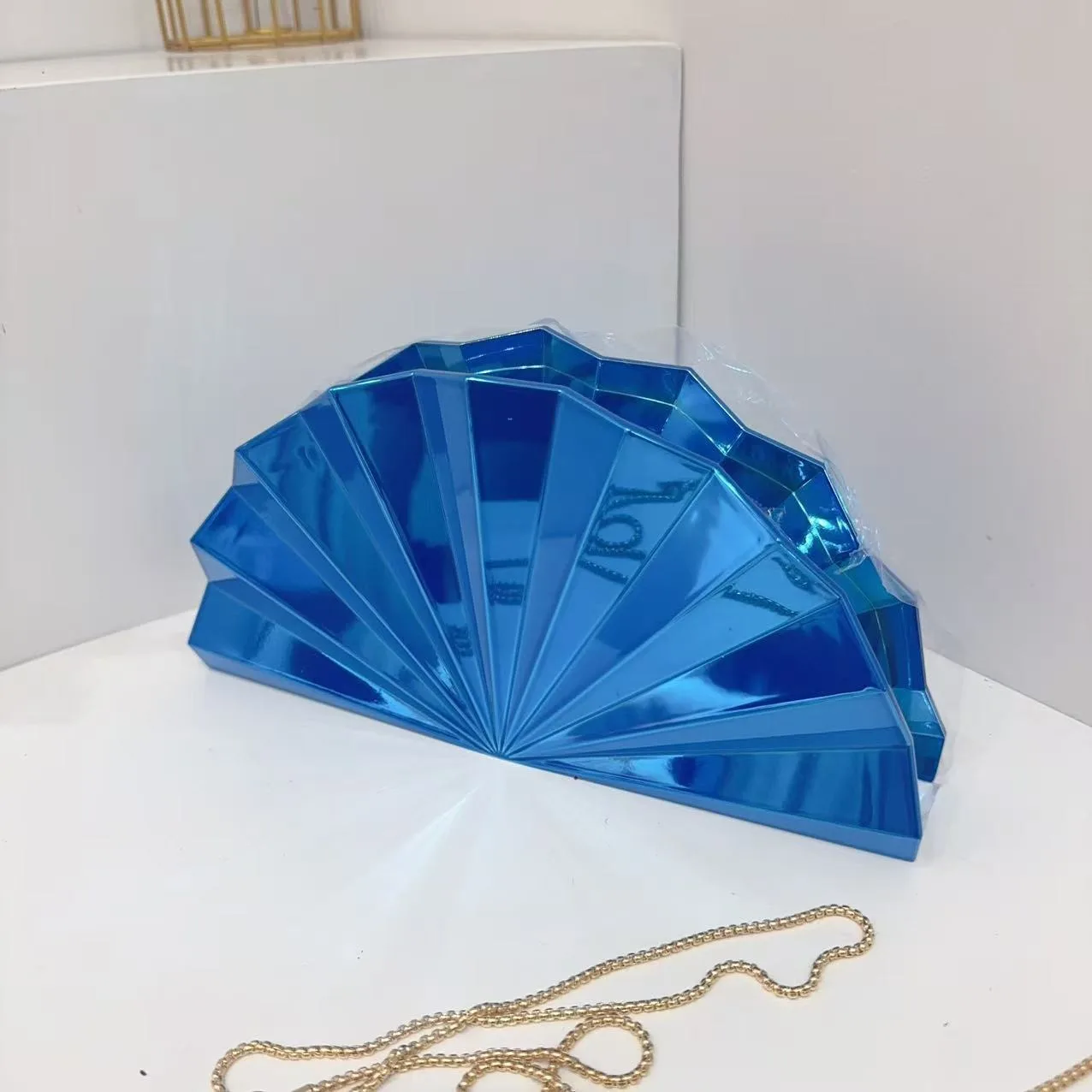 Gold acrylic box bag with chain strap