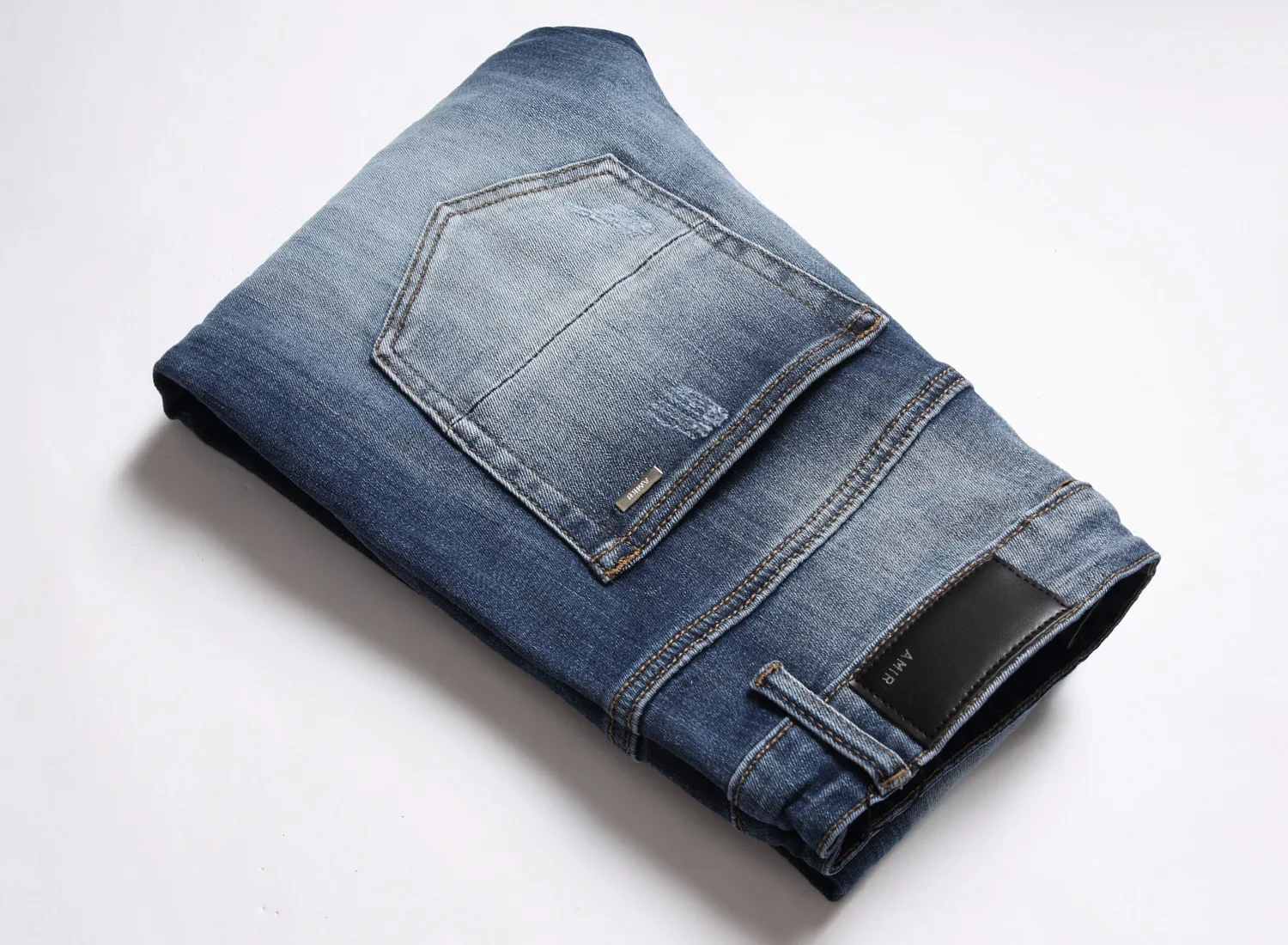 Manufacturers directly for men's European and American  jeans small foot hole pants wash elastic 
