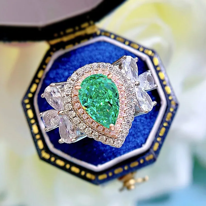 

Spring Qiaoer 925 Sterling Silver 6*9MM Crushed Ice Cut Emerald High Carbon Diamonds Gemstone Engagement Fine Jewelry Ring