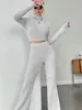 Stand Collar Navel T-shirt and Trumpet pants 3