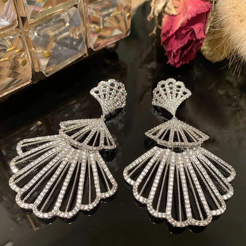 

2023 Autumn Female Fan Skirt Fashion Exaggerated Hollow Thin S925 Silver Needle Earrings