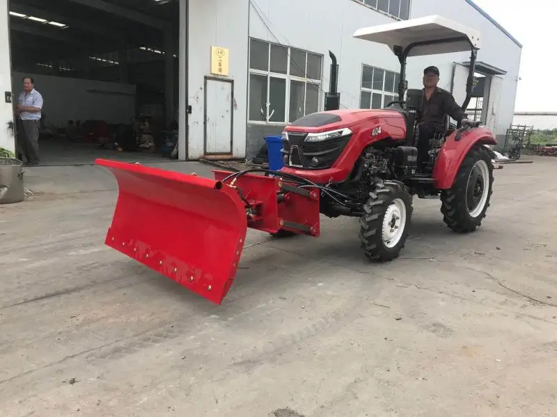 Tractors with front blade