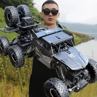 1: 18 Six Wheel Drive RC CAR Cross-country Climbing Spray Racing Car Remote Control Electric Car Fall Resistant Boy Toy Gift 2