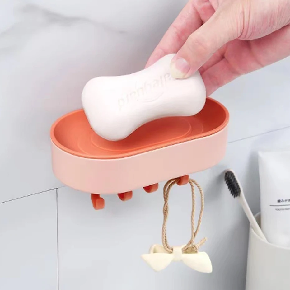 https://ae01.alicdn.com/kf/Sf20ae0a86c4e4ce5897ebc355680a1daZ/Bathroom-Wall-Mounted-Soap-Dish-With-Hook-Multifunctional-Self-Draining-Soap-Holder-Sponge-Storage-Rack-Kitchen.jpg