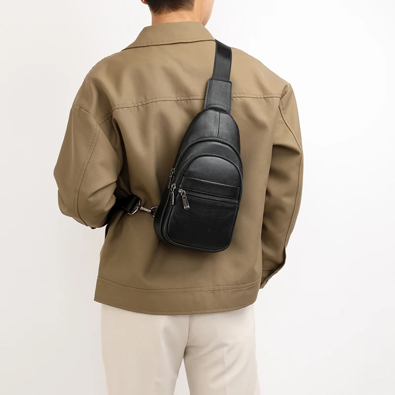 Stylish genuine leather sling bag for men with multiple compartments, ideal for everyday carry or travel