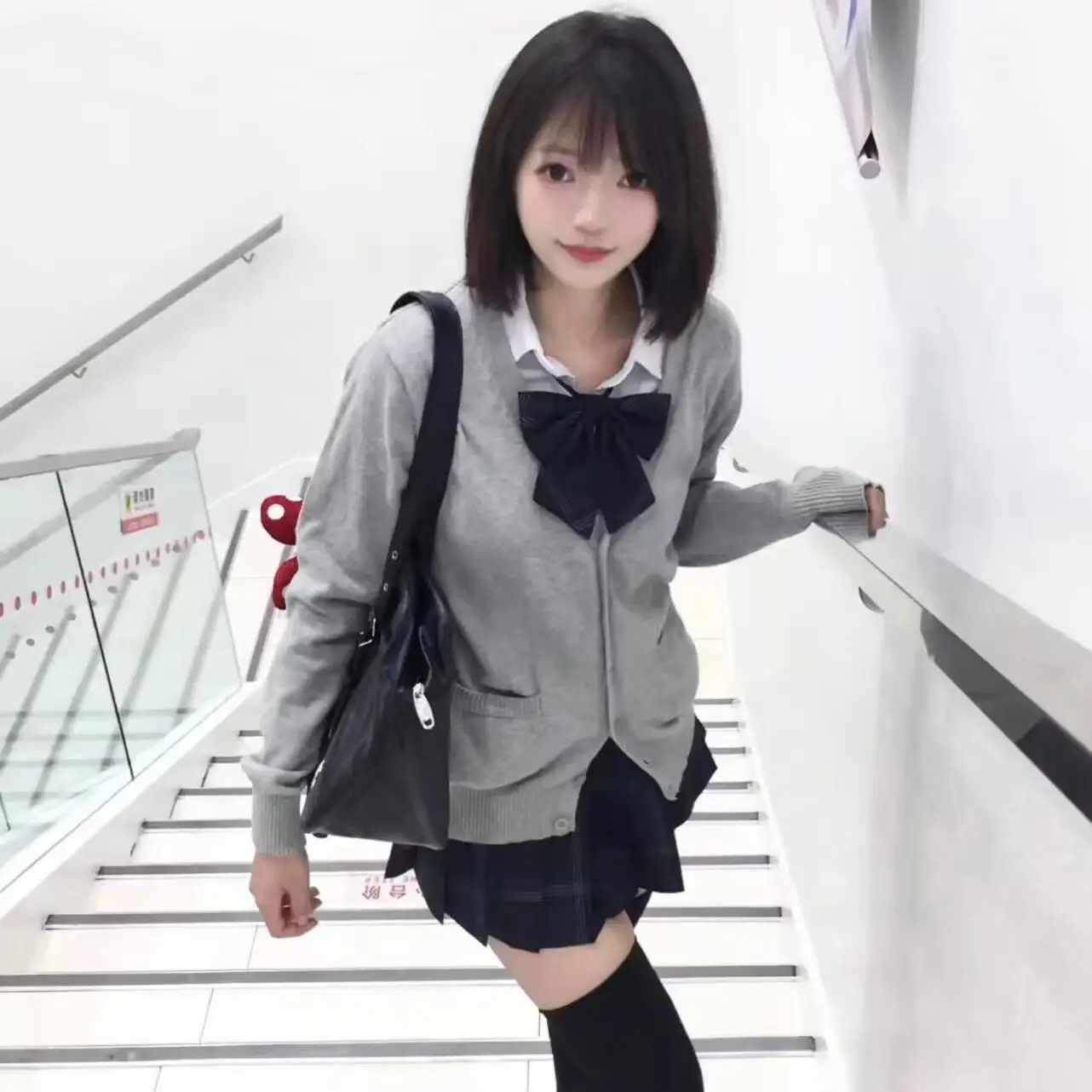 Original Japanese gray JK sweater 2024 autumn/winter college style knitted cardigan loose long sleeved V-neck women's jacket 2