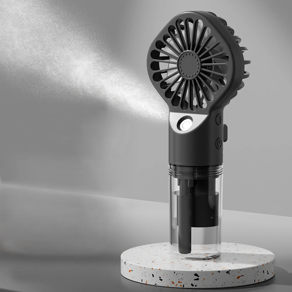 Compact USB Rechargeable Mist Fan - Handheld Low Noise Cooling with 4-Speed Settings